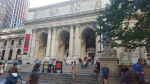 The steps of the New York Public Library are a gathering place for many. 