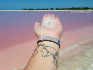 Holding salt at the pink lakes of Los Coloradas, Mexico