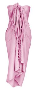 A pink sarong tied as a dress