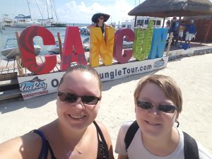 A selfie with the Cancun sign before getting on the boat for the Isla Mujeres organized tour