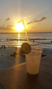 Having a margarita on the beach while watching the sunset on the north beach of Isla Mujeres