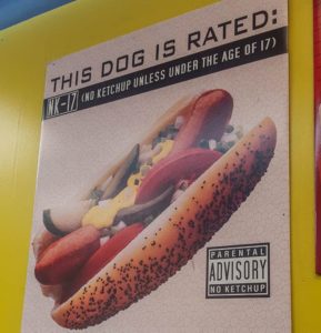 Poster showing a Chicago hotdog with the caption 'No Ketchup unless under the age of 17'