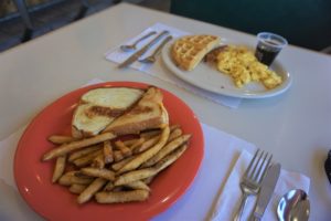 Grilled cheese sandwich & fries and waffles & eggs at Kix on 66 