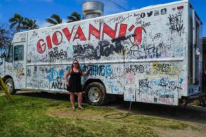 Me in front of the graffiti-filled Giovanni's Shrimp Truck truck